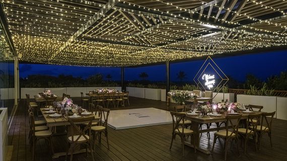 Weddings_by_Palladium_CMU_poseidon_terrace Deck by the village
